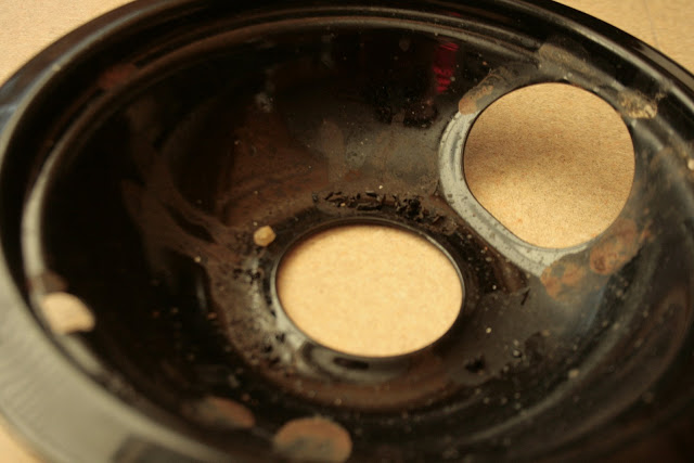 dirty burner drip pan