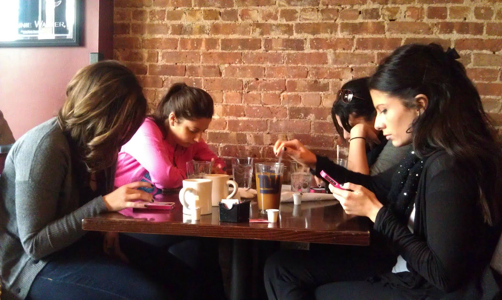 Friends checking phones