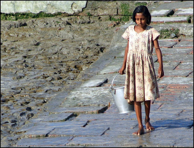 girl with bucket