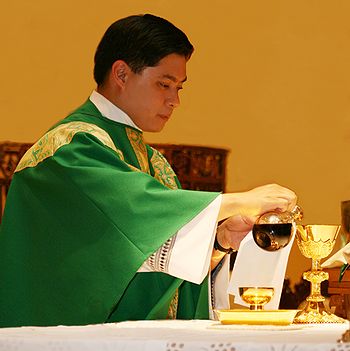 pouring wine at mass