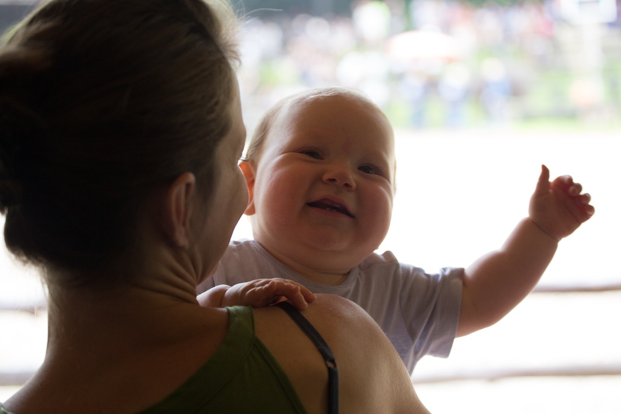 woman holding baby